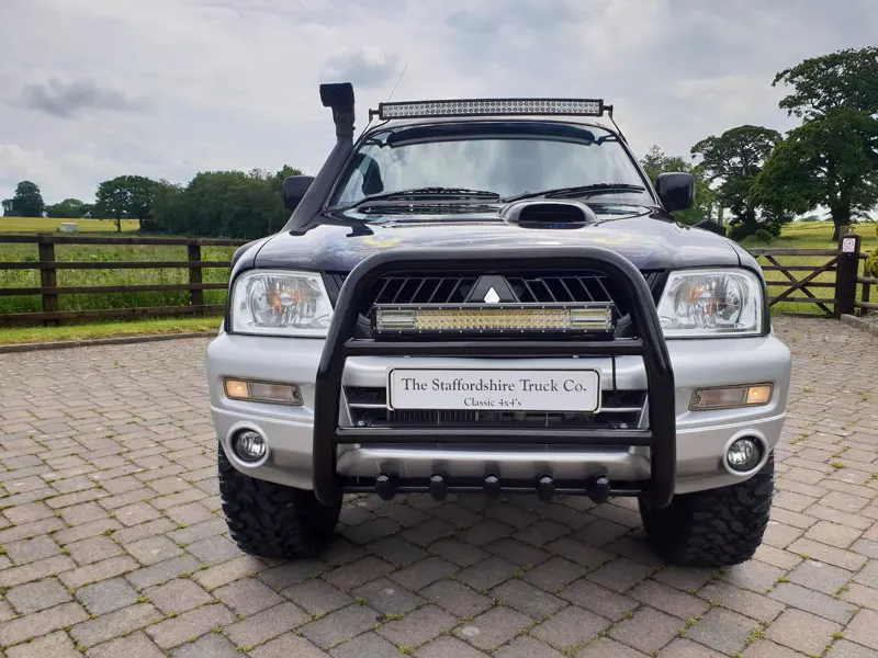 The Wolf Edition head-on, light bar above the bull bar
