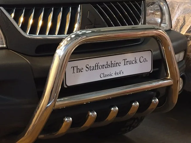 The stainless bull bar with the Staffordshire Truck Co. plaque